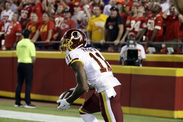 Washington Redskins wide receiver Terrelle Pryor Sr. (11) gets up after catching a touchdown pass during the first half of an NFL football game against the Kansas City Chiefs in Kansas City, Mo., Monday, Oct. 2, 2017. (AP Photo/Charlie Riedel)