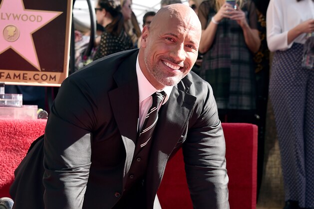 HOLLYWOOD, CA - DECEMBER 13:  Actor Dwayne Johnson attends a ceremony honoring him with the 2,624th star on the Hollywood Walk of Fame on December 13, 2017 in Hollywood, California.  (Photo by Alberto E. Rodriguez/Getty Images)