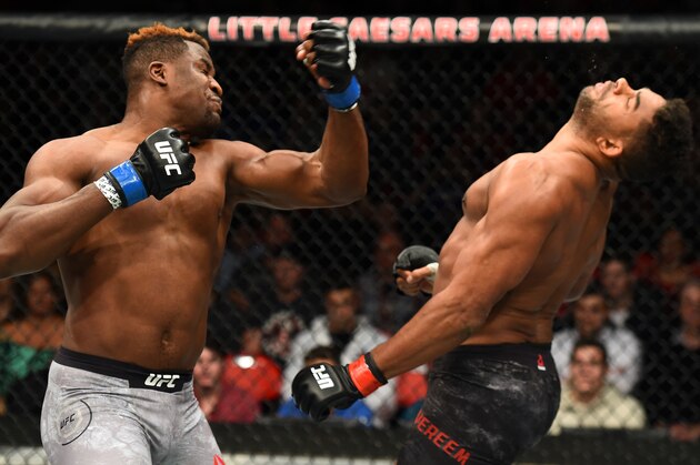 DETROIT, MI - DECEMBER 02:  (L-R) Francis Ngannou of Cameroon punches Alistair Overeem of The Netherlands in their heavyweight bout during the UFC 218 event inside Little Caesars Arena on December 02, 2017 in Detroit, Michigan. (Photo by Josh Hedges/Zuffa LLC/Zuffa LLC via Getty Images)