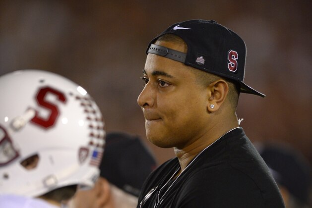 Miami Dolphins offensive lineman Jonathan Martin, who recently left the team, watches Southern California play Stanford during the first half of an NCAA college football game, Saturday, Nov. 16, 2013, in Los Angeles. (AP Photo/Mark J. Terrill)