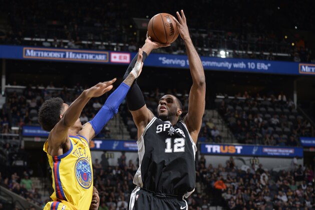 SAN ANTONIO, TX - MARCH 19:   LaMarcus Aldridge #12 of the San Antonio Spurs shoots the ball against the Golden State Warriors on March 19, 2018 at the AT&T Center in San Antonio, Texas. NOTE TO USER: User expressly acknowledges and agrees that, by downloading and or using this photograph, user is consenting to the terms and conditions of the Getty Images License Agreement. Mandatory Copyright Notice: Copyright 2018 NBAE (Photos by Mark Sobhani/NBAE via Getty Images)