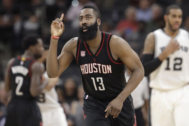 CORRECTS TERMS OF CONTRACT - FILE - In this May 9, 2017, file photo, Houston Rockets guard James Harden (13) gestures during Game 5 in the team's second-round NBA basketball playoff series against the San Antonio Spurs in San Antonio. The Rockets signed Harden to a four-year contract extension for about $160 million Saturday, July 8, giving him a total six-year deal with $228 million guaranteed. With Harden under contract on his existing deal for another two seasons, the extension will not affect Houston's aggressive pursuit of free agents this summer as the Rockets try to make a run at the Golden State Warriors. (AP Photo/Eric Gay, File)