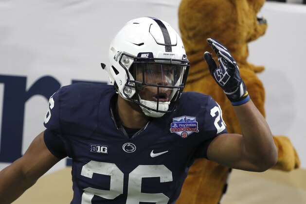 Penn State running back Saquon Barkley (26) against Washington during the Fiesta Bowl NCAA college football game, Saturday, Dec. 30, 2017, in Glendale, Ariz. (AP Photo/Rick Scuteri)