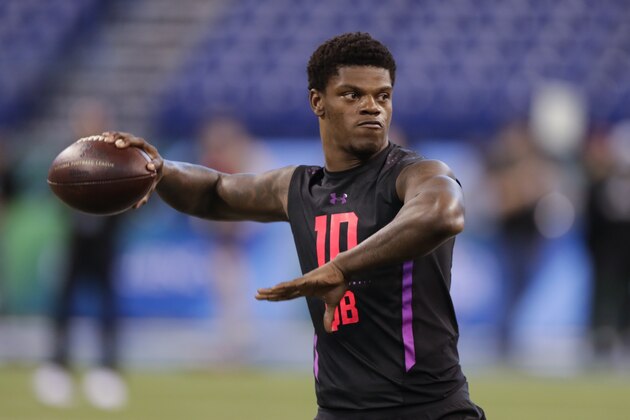 Louisville quarterback Lamar Jackson runs a drill at the NFL football scouting combine in Indianapolis, Saturday, March 3, 2018. (AP Photo/Michael Conroy)