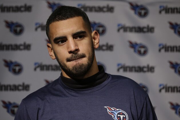 Tennessee Titans quarterback Marcus Mariota speaks to the media following an NFL divisional playoff football game against the New England Patriots, Sunday, Jan. 14, 2018, in Foxborough, Mass. (AP Photo/Steven Senne)