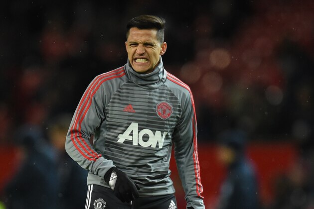 Manchester United's Chilean striker Alexis Sanchez warms up before the English FA Cup quarter-final football match between Manchester United and Brighton and Hove Albion at Old Trafford in Manchester, north west England, on March 17, 2018. / AFP PHOTO / Oli SCARFF / RESTRICTED TO EDITORIAL USE. No use with unauthorized audio, video, data, fixture lists, club/league logos or 'live' services. Online in-match use limited to 75 images, no video emulation. No use in betting, games or single club/league/player publications.  /         (Photo credit should read OLI SCARFF/AFP/Getty Images)
