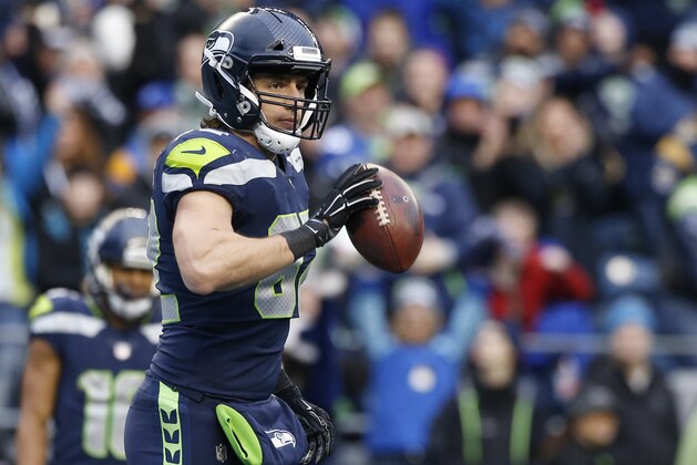 SEATTLE, WA - DECEMBER 17:  Tight end Luke Willson #82 of the Seattle Seahawks reacts after scoring a touchdown against the Los Angeles Rams during the third quarter of the game at CenturyLink Field on December 17, 2017 in Seattle, Washington.  (Photo by Otto Greule Jr /Getty Images)