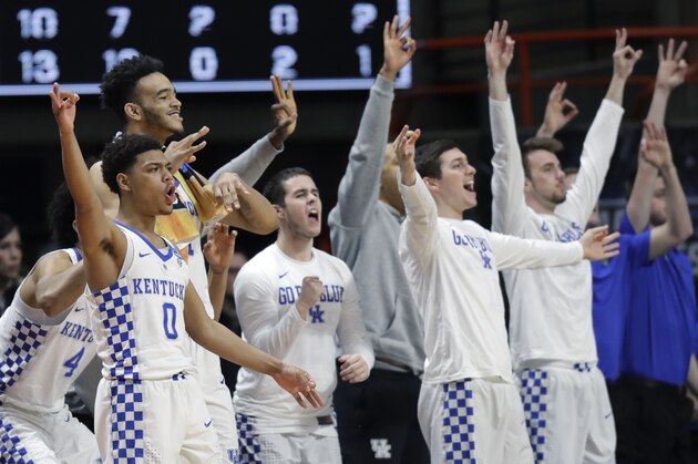 Players on the Kentucky bench react during the second half of a second-round game against Buffalo in the NCAA men's college basketball tournament Saturday, March 17, 2018, in Boise, Idaho. Kentucky won 95-75. (AP Photo/Ted S. Warren)