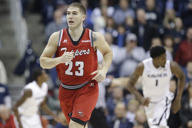 Western Kentucky's Justin Johnson runs the court in the first half of an NCAA college basketball game against Xavier, Saturday, Dec. 5, 2015, in Cincinnati. Xavier won 95-64. (AP Photo/John Minchillo)
