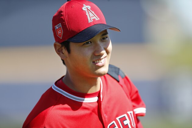 Los Angeles Angels' Shohei Ohtani walks on the field before a spring training baseball game against the San Diego Padres, Monday, Feb. 26, 2018, in Peoria, Ariz. (AP Photo/Charlie Neibergall)