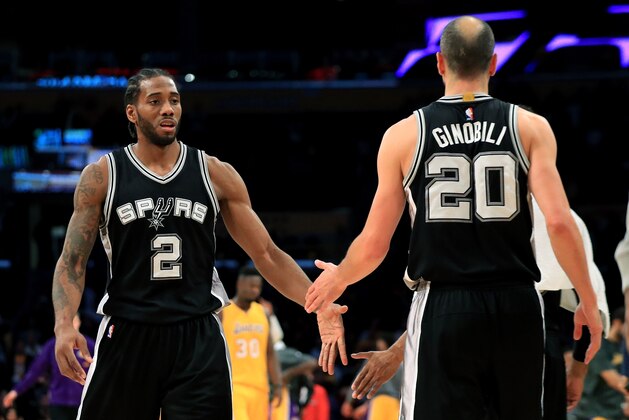 LOS ANGELES, CA - NOVEMBER 18:  Kawhi Leonard #2 congratulates Manu Ginobili #20 of the San Antonio Spurs after defeating the Los Angeles Lakers 116-107 during a game at Staples Center on November 18, 2016 in Los Angeles, California. NOTE TO USER: User expressly acknowledges and agrees that, by downloading and or using this photograph, User is consenting to the terms and conditions of the Getty Images License Agreement  (Photo by Sean M. Haffey/Getty Images)