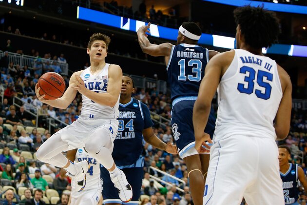 PITTSBURGH, PA - MARCH 17:  Grayson Allen #3 of the Duke Blue Devils passes the ball to Marvin Bagley III #35 against Stanford Robinson #13 of the Rhode Island Rams during the second half in the second round of the 2018 NCAA Men's Basketball Tournament at PPG PAINTS Arena on March 17, 2018 in Pittsburgh, Pennsylvania.  (Photo by Justin K. Aller/Getty Images)