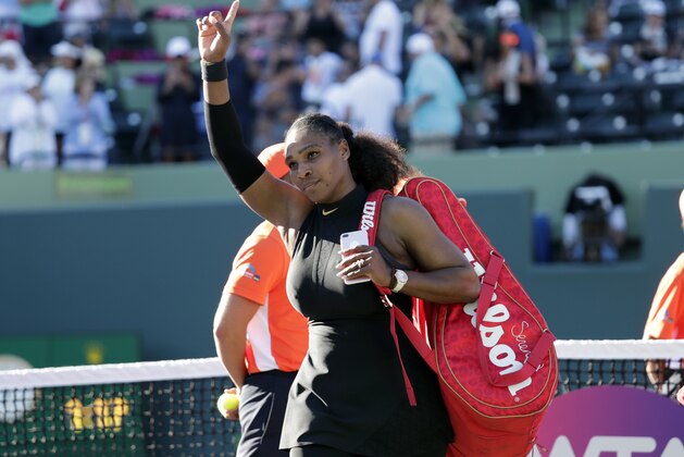 Serena Williams walks off the court after losing to Naomi Osaka, of Japan, at the Miami Open tennis tournament, Wednesday, March 21, 2018, in Key Biscayne, Fla. Osaka won 6-3, 6-2. (AP Photo/Lynne Sladky)