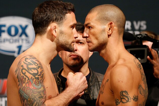 AUSTIN, TX - NOVEMBER 21:  (L-R) Opponents Frankie Edgar and Cub Swanson face off during the UFC weigh-in at The Frank Erwin Center on November 21, 2014 in Austin, Texas.  (Photo by Josh Hedges/Zuffa LLC/Zuffa LLC via Getty Images)