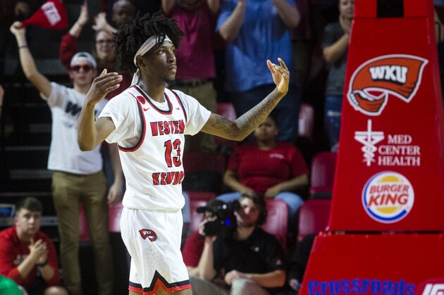BOWLING GREEN, KY - JANUARY 27:  Guard Taveion Hollingsworth #13 of the Western Kentucky Hilltoppers reacts after scoring in a game against Marshall University at E.A. Diddle Arena on January 27, 2018 in Bowling Green, Ky. (Photo by Shaban Athuman/ Getty Images)