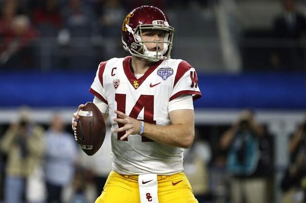 ARLINGTON, TX - DECEMBER 29: Sam Darnold #14 of the USC Trojans looks to throw against the Ohio State Buckeyes in the first half of the 82nd Goodyear Cotton Bowl Classic between USC and Ohio State at AT&T Stadium on December 29, 2017 in Arlington, Texas. (Photo by Ron Jenkins/Getty Images)