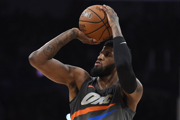 Oklahoma City Thunder's Paul George shoots during the NBA All-Star basketball Three Point contest, Saturday, Feb. 17, 2018, in Los Angeles. (AP Photo/Chris Pizzello)