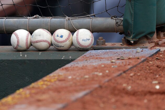 PHILADELPHIA, PA - JULY 23: Four baseballs sit on a ledge in the visitors dugout before a game between the Philadelphia Phillies and the Milwaukee Brewers at Citizens Bank Park on July 23, 2017 in Philadelphia, Pennsylvania. The Phillies won 6-3. (Photo by Hunter Martin/Getty Images) *** Local Caption ***