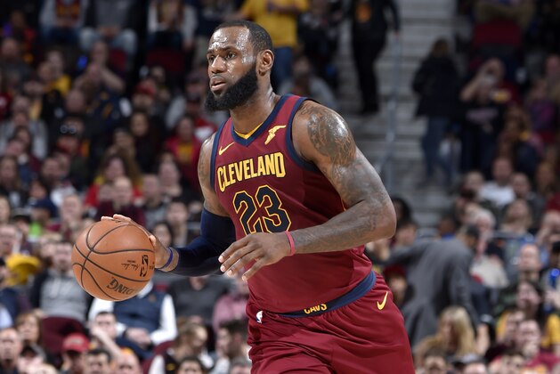 CLEVELAND, OH - MARCH 21:  LeBron James #23 of the Cleveland Cavaliers handles the ball against the Toronto Raptors on March 21, 2018 at Quicken Loans Arena in Cleveland, Ohio. NOTE TO USER: User expressly acknowledges and agrees that, by downloading and/or using this Photograph, user is consenting to the terms and conditions of the Getty Images License Agreement. Mandatory Copyright Notice: Copyright 2018 NBAE (Photo by David Liam Kyle/NBAE via Getty Images)