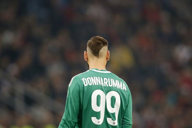 AC Milan goalkeeper Gianluigi Donnarumma stands during the Serie A soccer match between AC Milan and Juventus at the San Siro stadium in Milan, Italy, Saturday, Oct. 28, 2017. (AP Photo/Antonio Calanni)