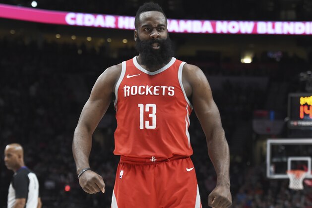 Houston Rockets guard James Harden reacts after making a play during the second half of the team's NBA basketball game against the Portland Trail Blazers in Portland, Ore., Tuesday, March 20, 2018. The Rockets won 115-111. (AP Photo/Steve Dykes)