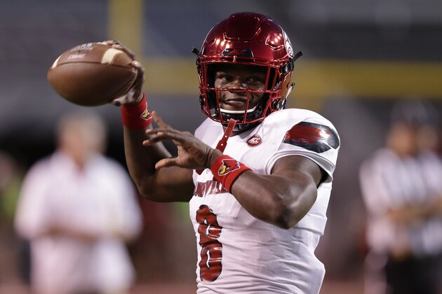 Louisville quarterback Lamar Jackson (8) warms up prior to an NCAA college football game against North Carolina State in Raleigh, N.C., Thursday, Oct. 5, 2017. (AP Photo/Gerry Broome)