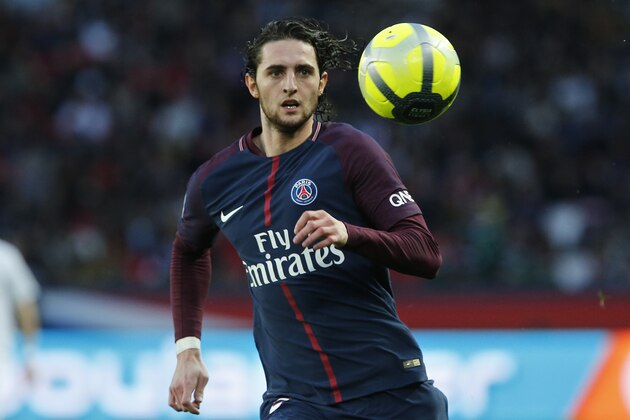 PSG's Adrien Rabiot runs after the ball during the French League One soccer match between Paris Saint-Germain and Metz at the Parc des Princes Stadium, in Paris, France, Saturday, March 10, 2018. (AP Photo/Thibault Camus)