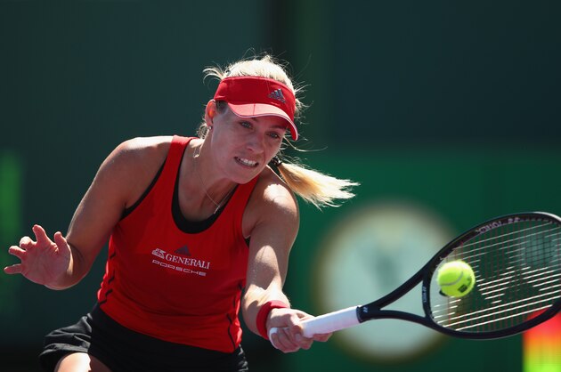 KEY BISCAYNE, FL - MARCH 22:  Angelique Kerber of Germany plays a forehand against Johanna Larsson of Sweden in their second round match during the Miami Open Presented by Itau at Crandon Park Tennis Center on March 22, 2018 in Key Biscayne, Florida.  (Photo by Clive Brunskill/Getty Images)