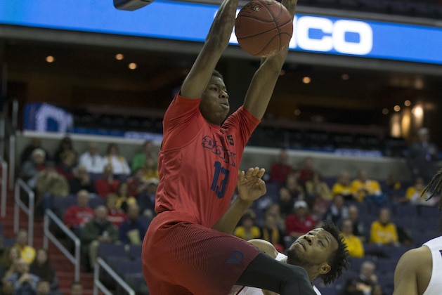 WASHINGTON, DC - MARCH 8: Kostas Antetokounmpo #13 of the Dayton Flyers dunks the ball against Khris Lane #21 of the Virginia Commonwealth Rams in the second round of the Atlantic 10 basketball tournament at Capital One Arena on March 8, 2018 in Washington, DC. (Photo by Mitchell Leff/Getty Images)