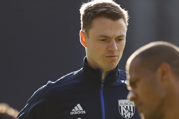West Bromwich Albion's Northern Irish defender Jonny Evans warms up ahead of the English FA Cup fifth round football match between West Bromwich Albion and Southampton at The Hawthorns stadium in West Bromwich, central England, on February 17, 2018.

Evans was one  of four senior West Brom players who apologised on Friday after being questioned by police in Spain over the theft of a taxi, an embarrassment which manager Alan Pardew described as 'not ideal'. / AFP PHOTO / Adrian DENNIS / RESTRICTED TO EDITORIAL USE. No use with unauthorized audio, video, data, fixture lists, club/league logos or 'live' services. Online in-match use limited to 75 images, no video emulation. No use in betting, games or single club/league/player publications.  /         (Photo credit should read ADRIAN DENNIS/AFP/Getty Images)