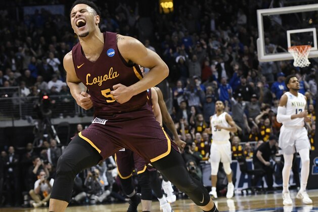 Loyola-Chicago guard Marques Townes (5) celebrates his three-point shot late in the game against Nevada during the second half of a regional semifinal NCAA college basketball game, Thursday, March 22, 2018, in Atlanta. Loyola-Chicago won 69-68. (AP Photo/John Amis)