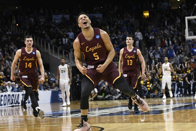Loyola-Chicago guard Marques Townes (5) celebrates his three-point shot late in the game against Nevada during the second half of a regional semifinal NCAA college basketball game, Thursday, March 22, 2018, in Atlanta. Loyola-Chicago won 69-68. (AP Photo/John Amis)