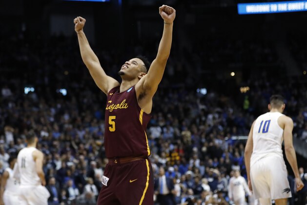 Loyola-Chicago guard Marques Townes celebrates victory after a regional semifinal NCAA college basketball game against Nevada, Thursday, March 22, 2018, in Atlanta. Loyola-Chicago won 69-68. (AP Photo/David Goldman)