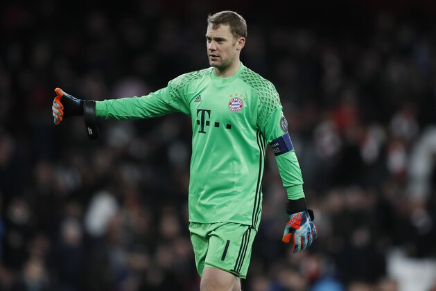 Bayern goalkeeper Manuel Neuer celebrates at the end of the Champions League round of 16 second leg soccer match between Arsenal and Bayern Munich at the Emirates Stadimum in London, Tuesday, March 7, 2017. Bayern won 5-1. (AP Photo/Kirsty Wigglesworth)