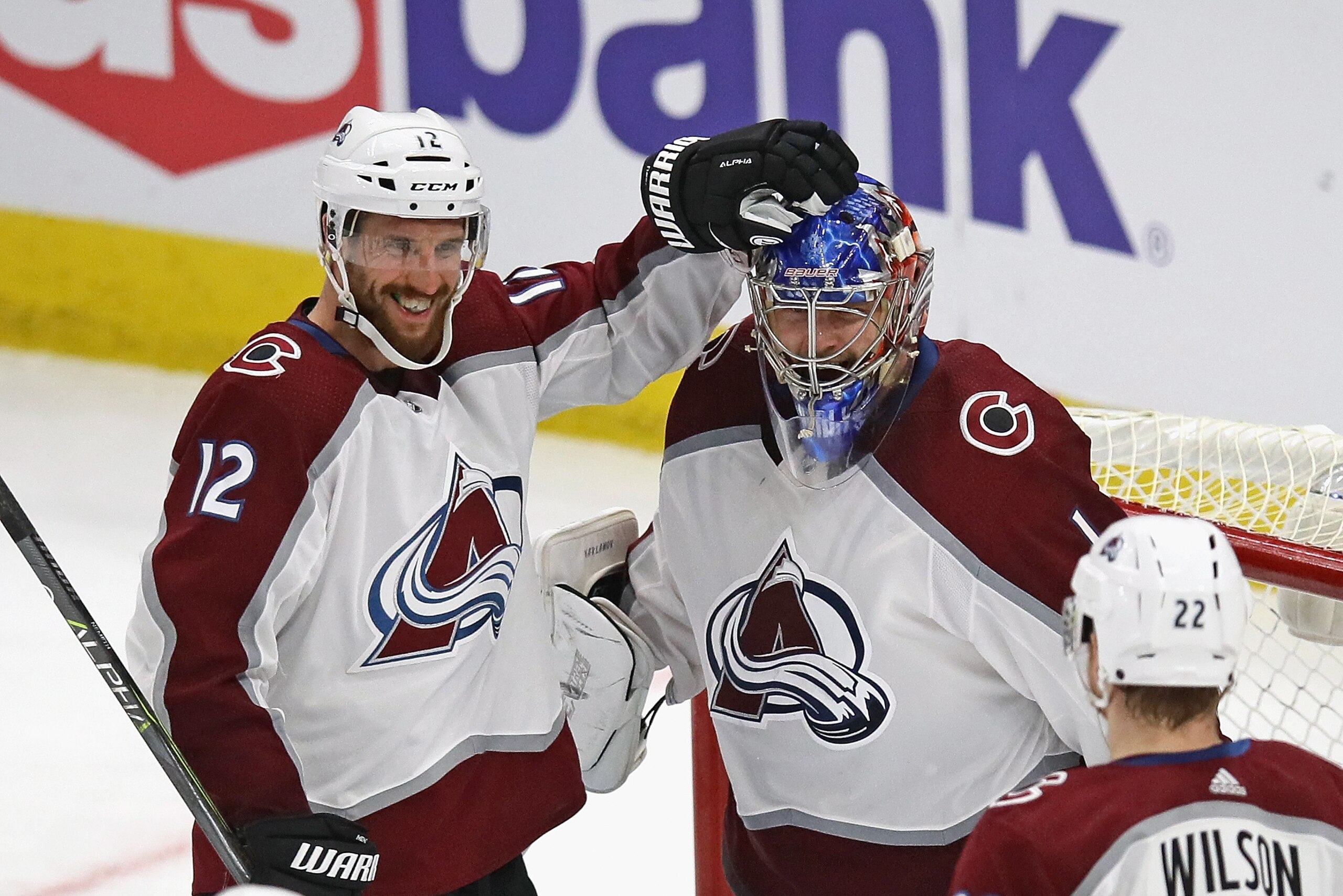 CHICAGO, IL - MARCH 20:  (L-R) Patrik Nemeth #12, Semyon Varlamov #1 and Colin Wilson #22 of the Colorado Avalanche celebrate a win over the Chicago Blackhawks at the United Center on March 20, 2018 in Chicago, Illinois. The Avalanche defeated the Blackhawks 5-1. (Photo by Jonathan Daniel/Getty Images)