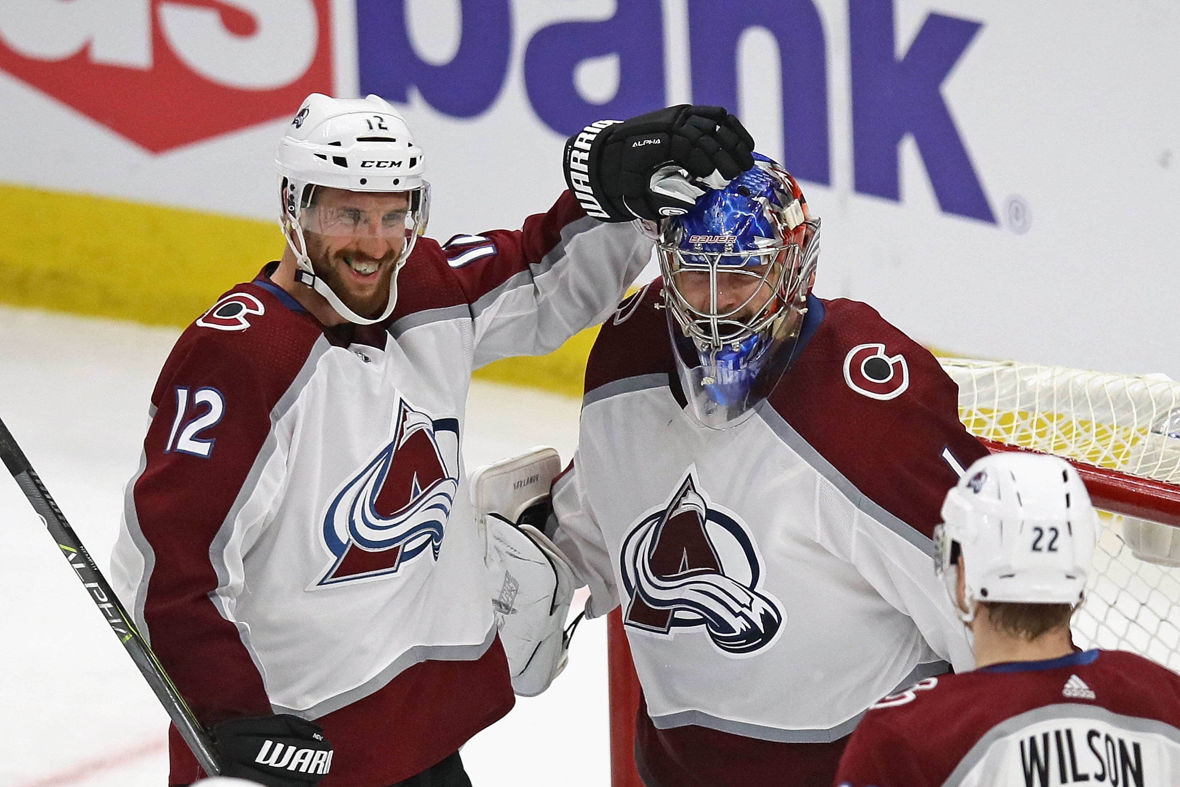 CHICAGO, IL - MARCH 20:  (L-R) Patrik Nemeth #12, Semyon Varlamov #1 and Colin Wilson #22 of the Colorado Avalanche celebrate a win over the Chicago Blackhawks at the United Center on March 20, 2018 in Chicago, Illinois. The Avalanche defeated the Blackhawks 5-1. (Photo by Jonathan Daniel/Getty Images)