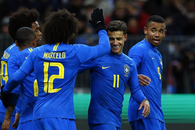 Brazil's Philippe Coutinho, 2nd right, celebrates after scoring his side's second goal during an international friendly soccer match between Russia and Brazil at the Luzhniki stadium in Moscow, Russia, Friday, March 23, 2018. (AP Photo/Alexander Zemlianichenko)