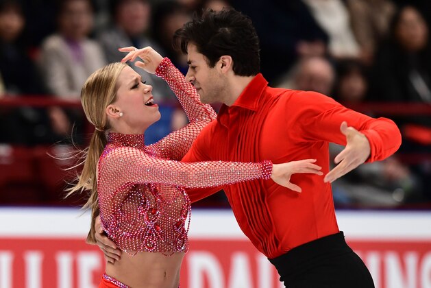 Canada's Kaitlyn Weaver and Andrew Poje perform during the Ice Dance Short Dance program at the Milano World Figure Skating Championship 2018 in Milan on March 23, 2018. / AFP PHOTO / MIGUEL MEDINA        (Photo credit should read MIGUEL MEDINA/AFP/Getty Images)