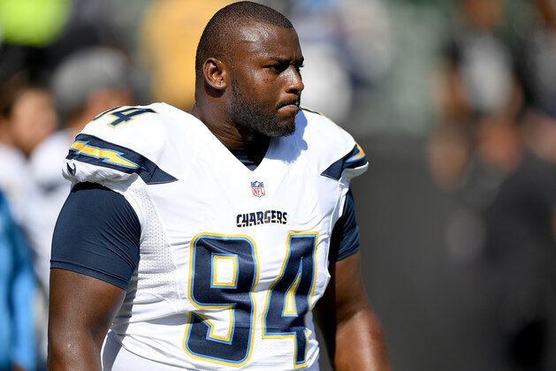 OAKLAND, CA - OCTOBER 09:  Corey Liuget #94 of the San Diego Chargers looks on during pregame warm ups prior to playing the Oakland Raiders in an NFL football game at Oakland-Alameda County Coliseum on October 9, 2016 in Oakland, California.  (Photo by Thearon W. Henderson/Getty Images)