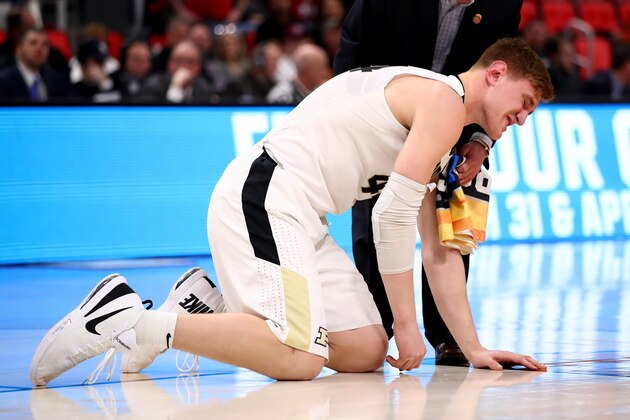 DETROIT, MI - MARCH 16:  Isaac Haas #44 of the Purdue Boilermakers reacts after falling to the court on a foul by Cal State Fullerton Titans during the second half of the game in the first round of the 2018 NCAA Men's Basketball Tournament at Little Caesars Arena on March 16, 2018 in Detroit, Michigan.  (Photo by Gregory Shamus/Getty Images)