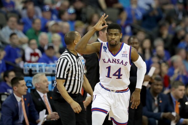 OMAHA, NE - MARCH 23:  Malik Newman #14 of the Kansas Jayhawks celebrates a three point basket against the Clemson Tigers during the first half in the 2018 NCAA Men's Basketball Tournament Midwest Regional at CenturyLink Center on March 23, 2018 in Omaha, Nebraska.  (Photo by Streeter Lecka/Getty Images)