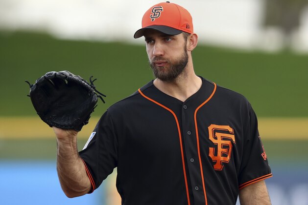 San Francisco Giants' Madison Bumgarner during a spring training baseball practice on Monday, Feb. 19, 2018 in Scottsdale, Ariz. (AP Photo/Ben Margot)