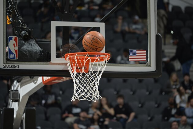SAN ANTONIO, TX - JANUARY 26:  A generic image of a basketball going towards the rim before the game between the Philadelphia 76ers and the San Antonio Spurs on January 26, 2018 at the AT&T Center in San Antonio, Texas. NOTE TO USER: User expressly acknowledges and agrees that, by downloading and or using this photograph, user is consenting to the terms and conditions of the Getty Images License Agreement. Mandatory Copyright Notice: Copyright 2018 NBAE (Photos by Mark Sobhani/NBAE via Getty Images)