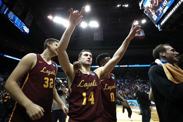 ATLANTA, GA - MARCH 22:  Ben Richardson #14 of the Loyola Ramblers celebrates after defeating the Nevada Wolf Pack during the 2018 NCAA Men's Basketball Tournament South Regional at Philips Arena on March 22, 2018 in Atlanta, Georgia. Loyola defeated Nevada 69-68.  (Photo by Ronald Martinez/Getty Images)