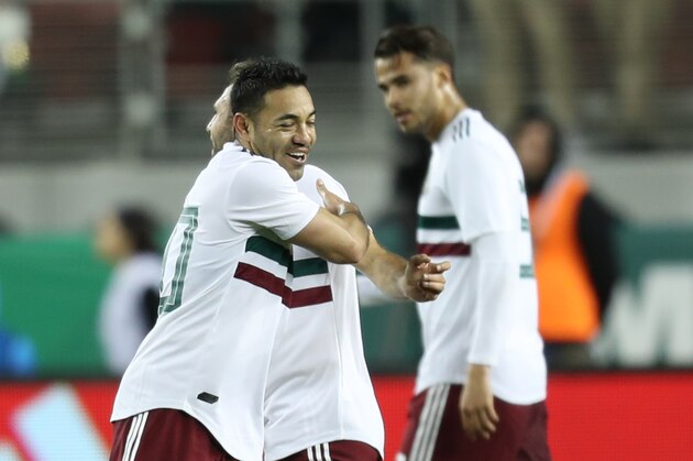 SANTA CLARA, CA - MARCH 23: Marco Fabian celebrates with teammates after scoring the first goal of his team during the friendly match between Mexico and Iceland at Levi's Stadium on March 23, 2018 in Santa Clara, California. (Photo by Omar Vega/Getty Images)