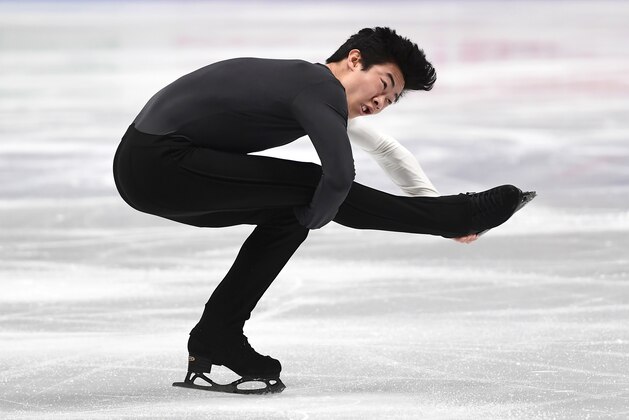 US's Nathan Chen performs during the Men's figure skating short program at the Milano World League Figure Skating Championship 2018 in Milan on March 22, 2018. / AFP PHOTO / MIGUEL MEDINA        (Photo credit should read MIGUEL MEDINA/AFP/Getty Images)