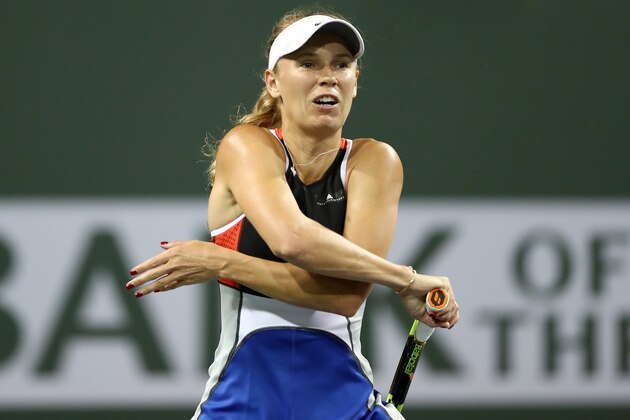 INDIAN WELLS, CA - MARCH 13:  Caroline Wozniacki of Denmark plays Daria Kasatkina of Russia during the BNP Paribas Open at the Indian Wells Tennis Garden on March 13, 2018 in Indian Wells, California.  (Photo by Matthew Stockman/Getty Images)