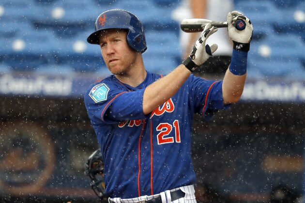 New York Mets' Todd Frazier steps out of the batter's box to take a swing as rain falls just before the start of a rain delay during the third inning of an exhibition spring training baseball game against the Houston Astros Tuesday, Feb. 27, 2018, in Port St. Lucie, Fla. (AP Photo/Jeff Roberson)