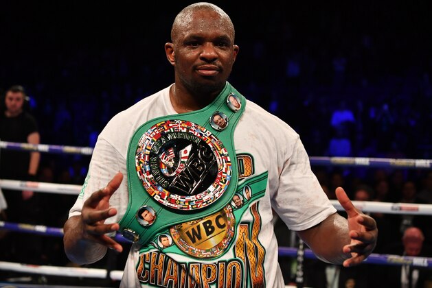 LONDON, ENGLAND - MARCH 24:  Dillian Whyte celebrates his sixth round knockout victory over Lucas Browne during their WBC Silver Heavyweight Championship  at The O2 Arena on March 24, 2018 in London, England.  (Photo by Dan Mullan/Getty Images)