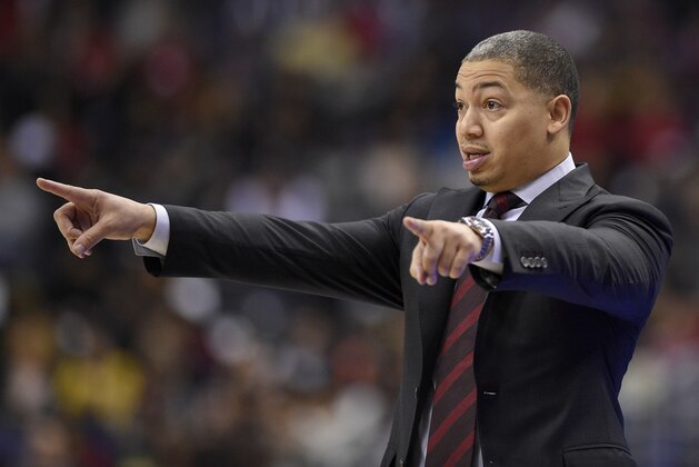 Cleveland Cavaliers head coach Tyronn Lue points during the first half of an NBA basketball game against the Washington Wizards, Sunday, Dec. 17, 2017, in Washington. (AP Photo/Nick Wass)